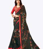 Dark green printed georgette saree with blouse