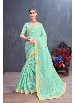 Aqua blue embroidered organza saree with blouse 1