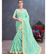 Aqua blue embroidered organza saree with blouse