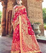 Rani pink woven banarasi silk saree with blouse