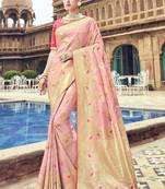Pink woven banarasi silk saree with blouse