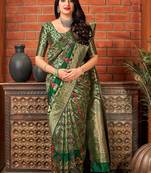 Dark green woven banarasi silk saree with blouse