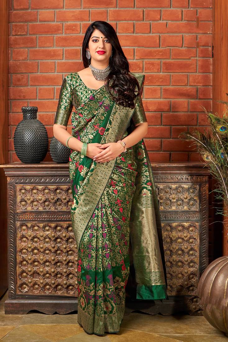 Dark green woven banarasi silk saree with blouse