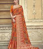 Red woven banarasi silk saree with blouse