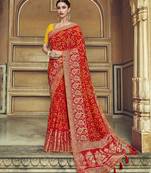 Red woven banarasi silk saree with blouse