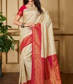Cream woven banarasi silk saree with blouse