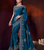 Blue embroidered satin saree with blouse