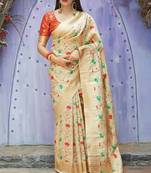 Cream woven banarasi silk saree with blouse