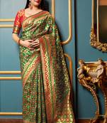 Green woven banarasi silk saree with blouse
