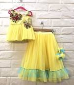 Lemon Yellow Zari Work Net Peplum Blouse And Skirt