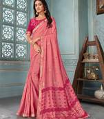 Pink printed faux georgette saree with blouse