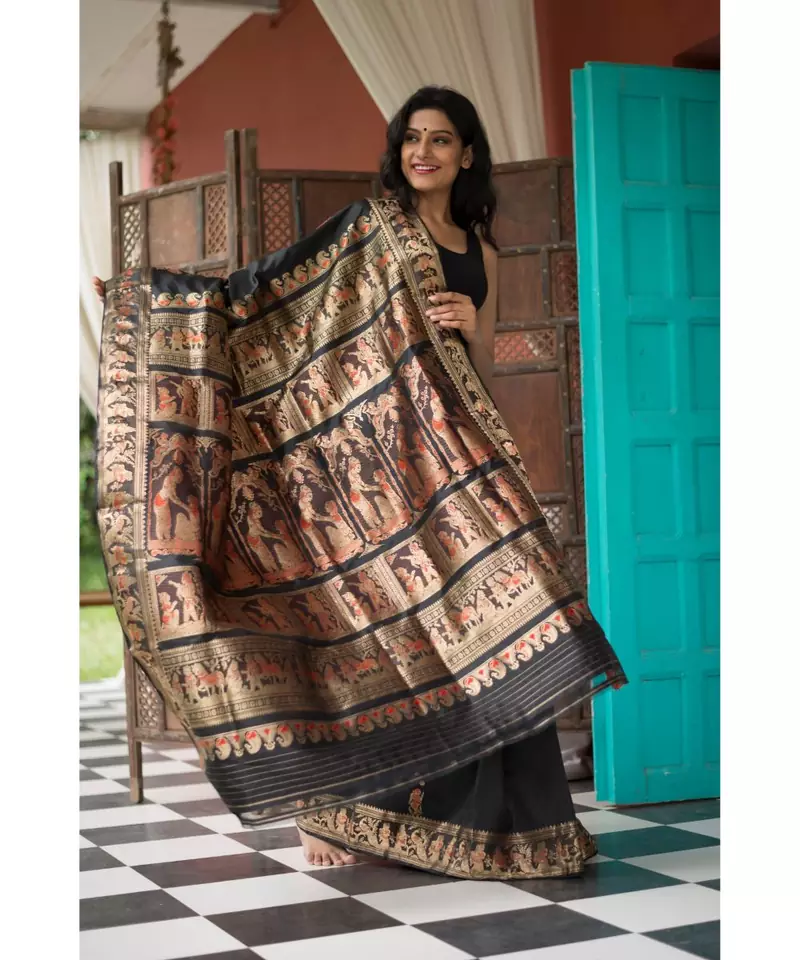 Black Stunning baluchari saree in black with golden zari and meenakari work