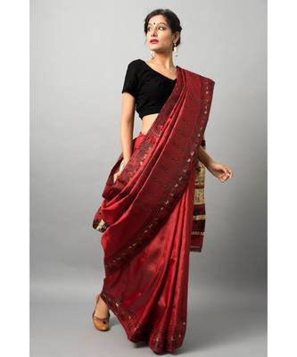 The beautiful Baluchari weave looks absolutely stunning in this maroon avatar 2