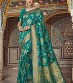Green woven banarasi silk saree with blouse