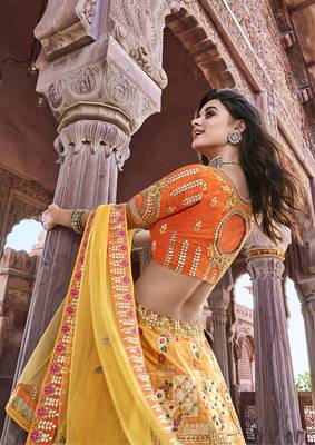 Mustard embroidered
 silk semi stitched lehenga 2