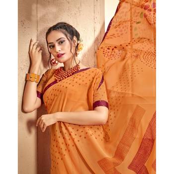 Orange printed georgette saree with blouse 2