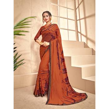 Orange printed georgette saree with blouse 1
