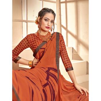 Orange printed georgette saree with blouse 2