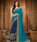 Dark green embroidered silk saree with blouse