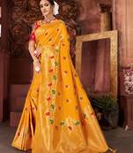 Yellow woven banarasi silk saree with blouse
