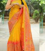 Yellow woven banarasi silk saree with blouse
