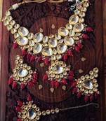 Kundan And Pearls Necklace Set With Red Onyx Gemstones