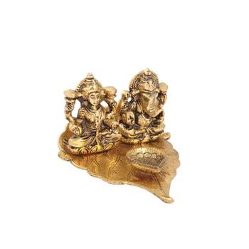 Lakshmi Ganesh diya on pipal leaf with diya antique gold plated 1