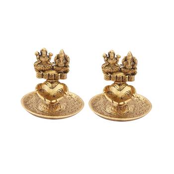 Lakshmi Ganesh hand diya pair in metal antique gold plated 1