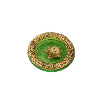 Tortoise incense holder placed in Green glass vessel with metal border 1