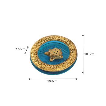 Tortoise incense holder placed in Turquoise glass vessel with metal border 2