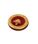 Tortoise incense holder placed in Red glass vessel with metal border