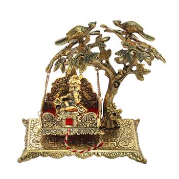 Krishna seated on a Jhoola hanging on Tree in metal 1