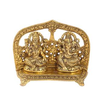 Lakshmi Ganesh gold plated in metal seated with arch at back 1