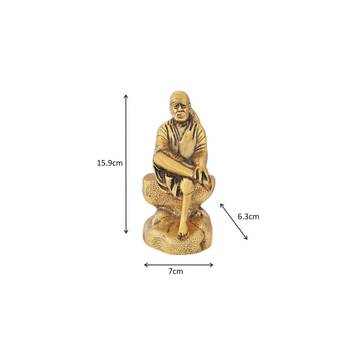 Sai baba seated on a rock in metal antique gold plated 2