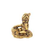 Bal Krishna eating butter in metal