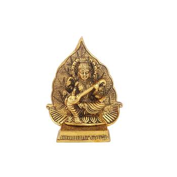 Saraswati ji with leaf back drop in antique golden finish metal 1