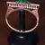 Rose Gold Plated Emerald and AAA CZ Embellished Designer Bracelet BD413