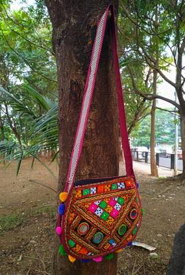 Real Mirror Worked Matka Shaped Kutch Embroidered Banjara Jhola Bag With Multicolored Pompoms All Around 2