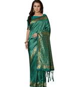 Green woven Silk blend saree with blouse