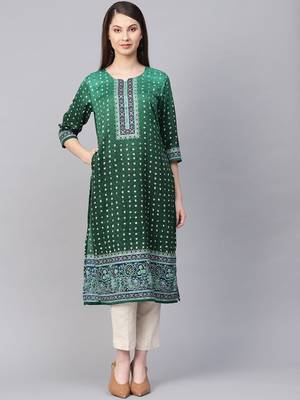 Green printed art silk kurtas-and-kurtis 1