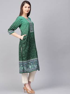 Green printed art silk kurtas-and-kurtis 4