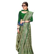 green woven banarasi saree with blouse