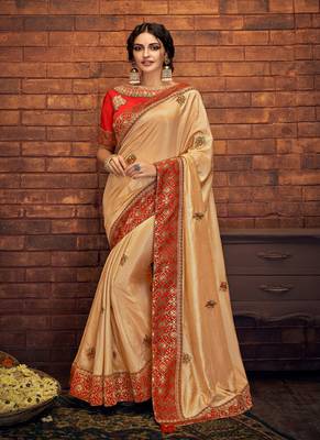 Cream embroidered satin saree with blouse 1