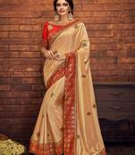 Cream embroidered satin saree with blouse