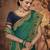   dark green embroidered silk saree with blouse