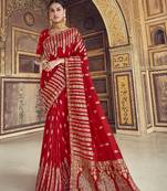 Red woven silk blend saree with blouse