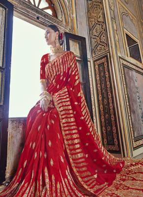 Red woven silk blend saree with blouse 2
