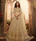 Beige embroidered net semi stitched lehenga