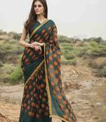 Green printed georgette saree with blouse