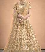 Beige Stone, Dori, Zari And Thread Embroidered Satin Lehenga choli for bride